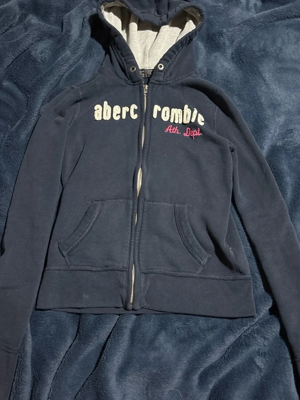 abercrombie kids navy zip-up hoodie with cream lettering